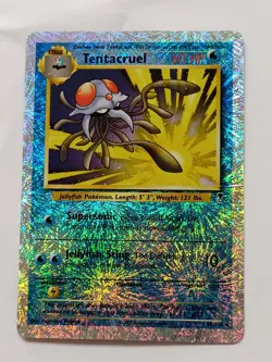 Tentacruel 66/110 Reverse Holo Pokemon Card has damage - Image 1