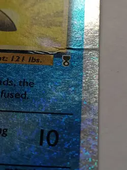 Tentacruel 66/110 Reverse Holo Pokemon Card has damage - Image 3