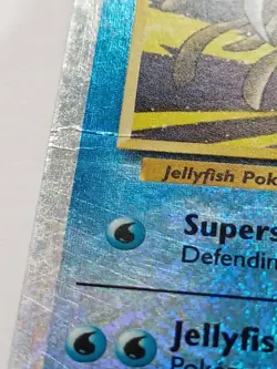 Tentacruel 66/110 Reverse Holo Pokemon Card has damage - Image 4