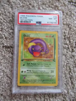 1999 POKEMON FOSSIL #46 EKANS FIRST EDITION - Image 1