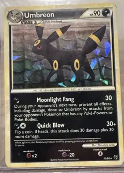 Umbreon 10/90 HGSS Undaunted Cracked Ice Holo Card between light/light moderate - Image 1