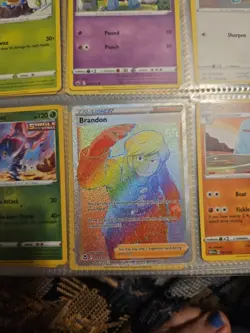 Brandon 203/195 - Pokemon SWSH12: Silver Tempest Rainbow Secret Rare Card - Image 1