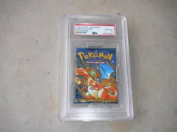 1999 POKEMON WOTC BASE CHARIZARD FOIL BOOSTER BLISTER PACK POKEMON PSA 10 - Image 1