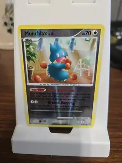 MUNCHLAX Rising Rivals Series POKEMON Reverse Holo 2009 Card 70/111 - Image 1