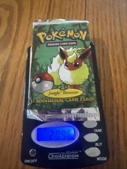 Wizards of the Coast First Edition Pokemon Jungle Booster Pack 742818060639 - Image 1