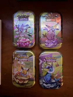 Lot of 4 - Pokemon TCG - Prismatic Evolutions Mini Tins - FACTORY SEALED - Image 1