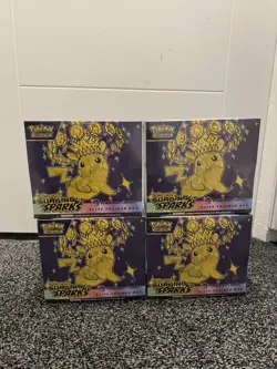 Pokemon Center ETB Surging Sparks Elite Trainer Box - Image 1