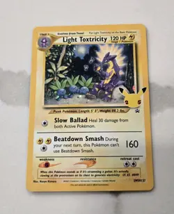 Pokemon TCG Light Toxtricity SWSH137 Celebrations Black Star Promo - Image 1