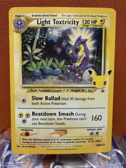 Light Toxtricity SWSH137 Black Star Promo Stamped Celebrations Pokemon NM 2032 - Image 1