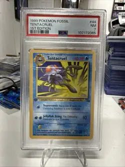 Pokemon TCG Fossil 1st Edition Tentacruel 44/62 Regular PSA 7 - Image 1