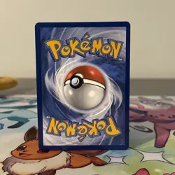Pokemon TCG Prismatic Eevee Collection Pouch w/ 5 Card Lot & Bonus Playing Mat - Image 3