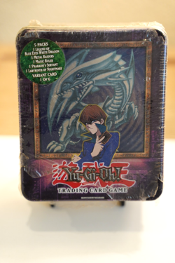 Yugioh 2003 Blue Eyes White Dragon Collectors Tin Factory Sealed (Torn Wrap) - Image 1