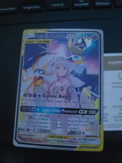 pokemon card near mint Solgaleo & Lunala GX Tag Team Holo - Image 1