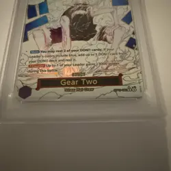 2025 ONE PIECE OP11-A FIST OF DIVINE SPEED 080 GEAR TWO ALTERNATE ART ENG PSA 10 - Image 4