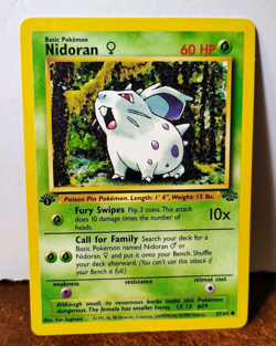 POKEMON NIDORAN 57/64 1ST EDITION JUNGLE LP - Image 1