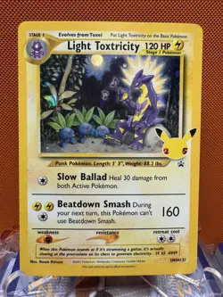 Light Toxtricity SWSH137 Black Star Promo Stamped Celebrations Pokemon NM 2031 - Image 1