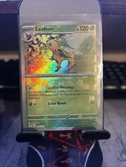 Pokemon TCG SV-Prismatic Evolutions Leafeon #5/131 Rare Master Ball - Image 1