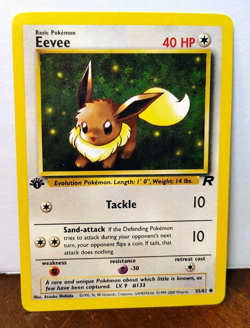 POKEMON EEVEE 55/82 1ST EDITION TEAM ROCKET MP-LP - Image 1