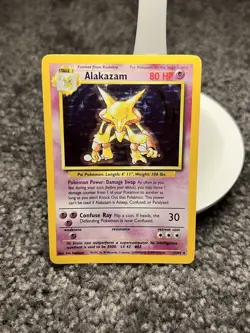Pokemon Alakazam 1/102 Holo Rare Base Set Stage 2 1999 Wizards of the Coast - Image 1