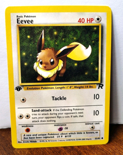 POKEMON EEVEE 55/82 1ST EDITION TEAM ROCKET LP-NM - Image 1