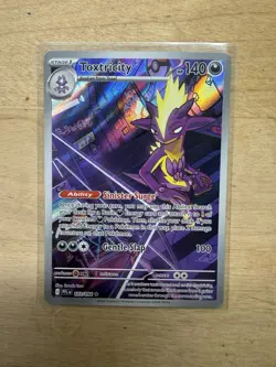 Toxtricity 103/094 Me02: Phantasmal Flames Holo Pokemon Card - Image 1