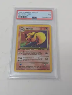 1999 POKEMON JUNGLE 1ST EDITION #3 FLAREON-HOLO PSA 7 - Image 1