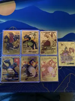 Mix of 7 Gold Charizard Pokemon Cards In Hard Cases. Perfect Condition - Image 1