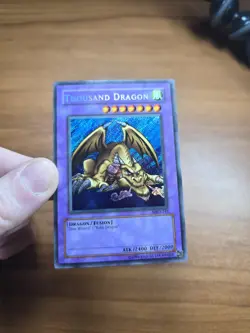 Thousand Dragon MRD-143 Unlimited Yu-Gi-Oh Secret Rare Card Lightly Played LP - Image 1