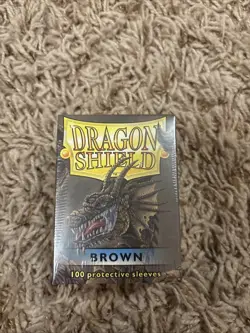 Dragon Shield 100 Standard Card Sleeves Brown - Image 1
