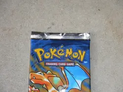1999 POKEMON BASE SET UNLIMITED BOOSTER PACK CHARIZARD ART FOIL PACKS - Image 2