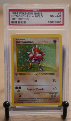 1999 Pokemon Hitmonchan Holo 1st Edition Base Set Shadowless PSA 8 NM - Image 1