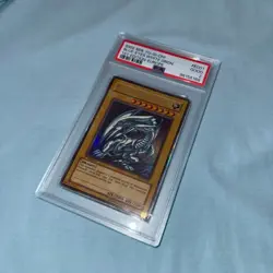 YuGiOh - Blue-Eyes White Dragon 1st Edition SDK-E001 - PSA 2 - Image 1