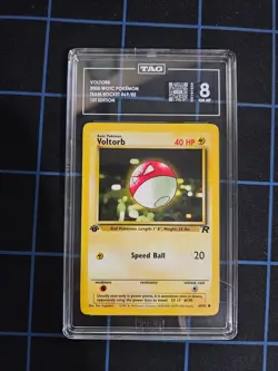 Pokemon 2000 Voltorb 69/82 Team Rocket 1st Edition TAG NEAR MINT 8 - Image 1