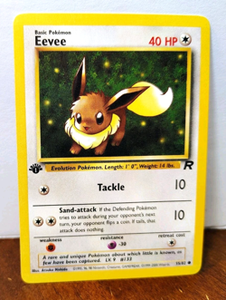 POKEMON EEVEE 55/82 1ST EDITION TEAM ROCKET MP-LP - Image 1