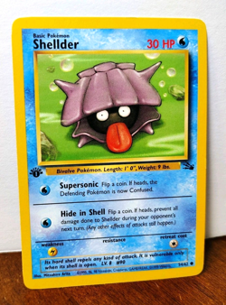 POKEMON SHELLDER 54/62 1ST EDITION FOSSIL LP-NM - Image 1