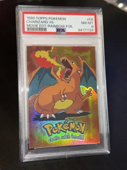 1999 Topps Pokemon Charizard Movie Edition Rainbow Foil PSA 8 Near Mint- Mint - Image 1