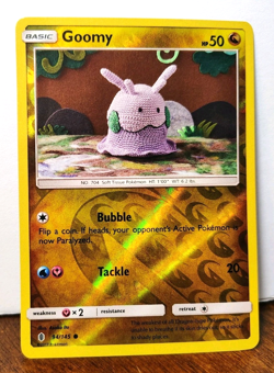 POKEMON GOOMY 94/145 REVERSE HOLO GUARDIANS RISING LP AMIGURUMI ASAKO ITO - Image 1