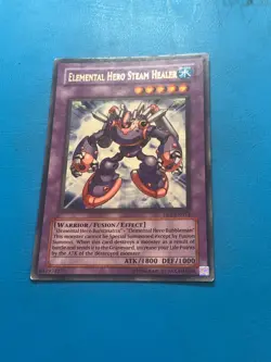 YUGIOH Ultra Rare Elemental Hero Steam Healer DP1-EN013 PLAYED - Image 1
