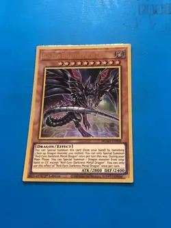 YUGIOH Gold Rare Red-Eyes Darkness Metal Dragon MGED-EN009 1st Edition - Image 1
