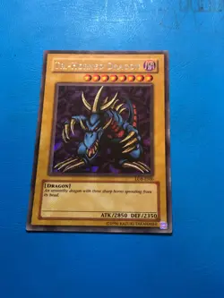 YUGIOH Secret Rare Tri-Horned Dragon LOB-E000 PLAYED - Image 1