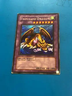 YUGIOH Secret Rare Thousand Dragon MRD-E143 PLAYED - Image 1