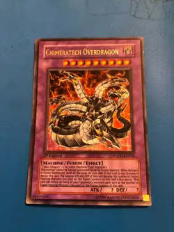 YUGIOH Ultra Rare Chimeratech Overdragon POTD-EN034 1st Edition PLAYED - Image 1