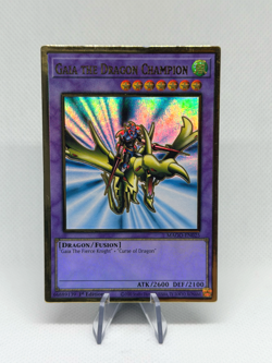 Gaia the Dragon Champion MAGO-EN025 Premium Gold Rare 1st Edition NM YuGiOh - Image 1