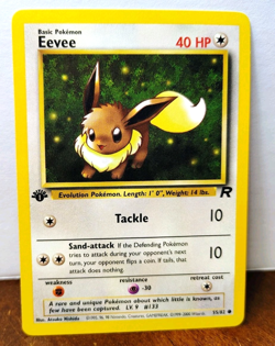 POKEMON EEVEE 55/82 1ST EDITION TEAM ROCKET LP-NM - Image 1