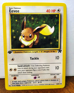 POKEMON EEVEE 55/82 1ST EDITION TEAM ROCKET LP - Image 1