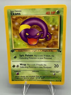 Ekans 46/62 1st-Edition Fossil English WOTC Pokemon 1999 Vtg TCG NM - Image 1