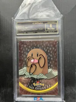 Pokemon Diglett 1999 No. 50 Topps Pokemon Series 1 - 2nd Print - Flames Silver - Image 1