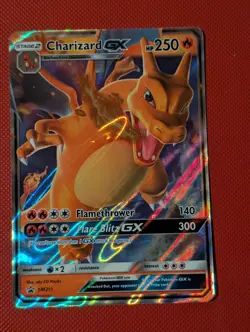 Pokemon TCG - Charizard GX - SM211 - Black Star Promo Hidden Fates - Image 1