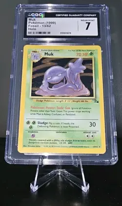 Muk CGC Near Mint 7 Pokemon (1999) Fossil 13/62 Holo Pokemon Card Slab - Image 1