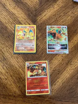 Charizard Pokemon Card Lot – Base Set 1999 Holo + Modern VSTAR + Roaring Resolve - Image 1